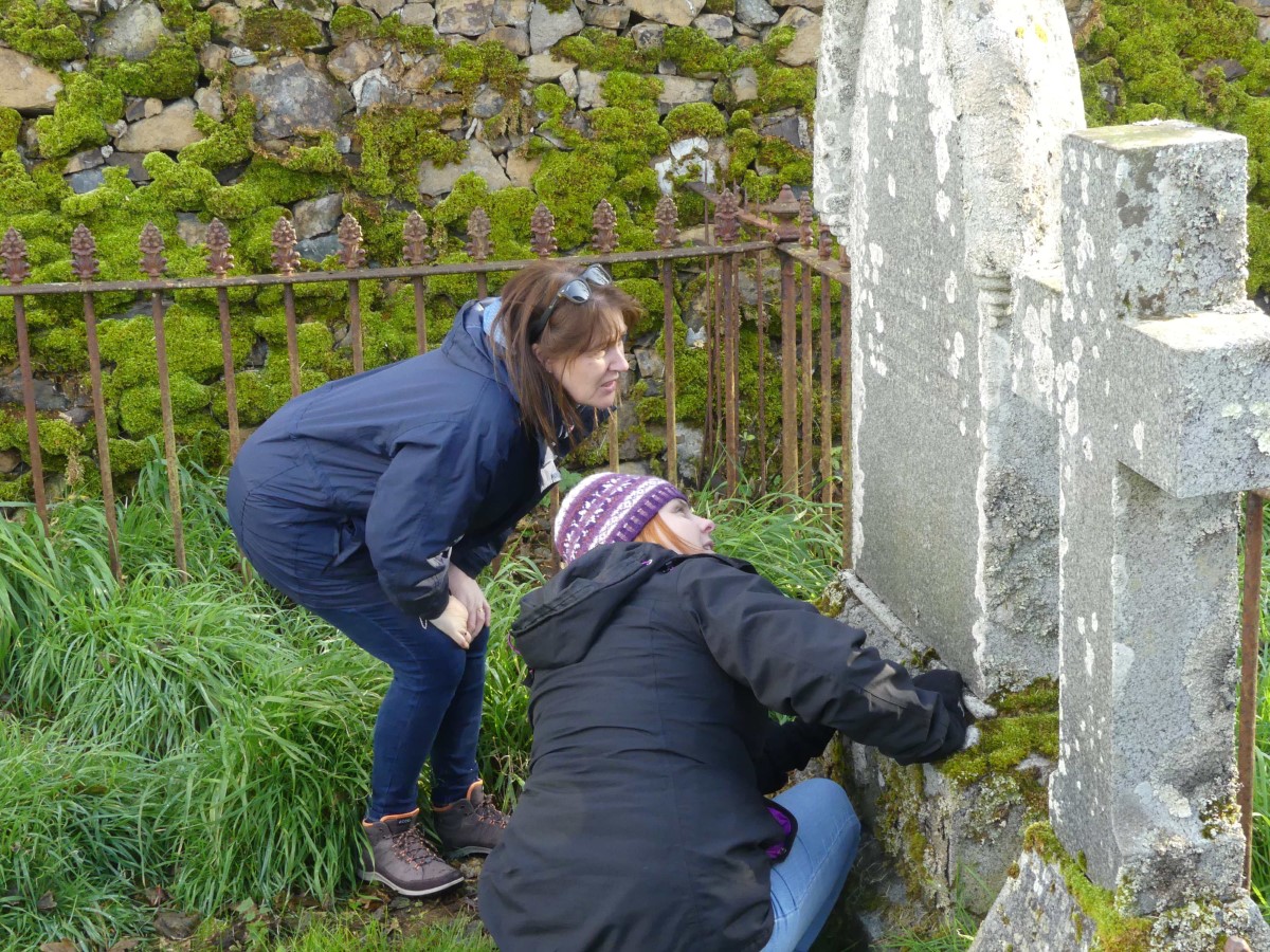 Studying the gravestones of the Edmonstons, Halligarth, Unst